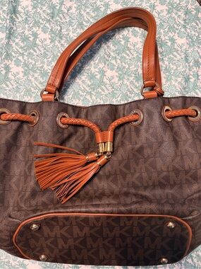 Michael Kors Brown Logo Shoulder Tote with Tan Trim and Tassel
